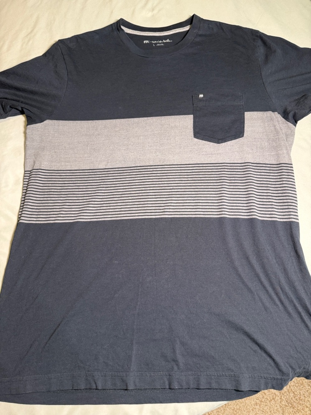Travis Mathew Navy and Light Gray Striped Pocket Tee